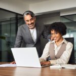 man discussing IT managed services to client